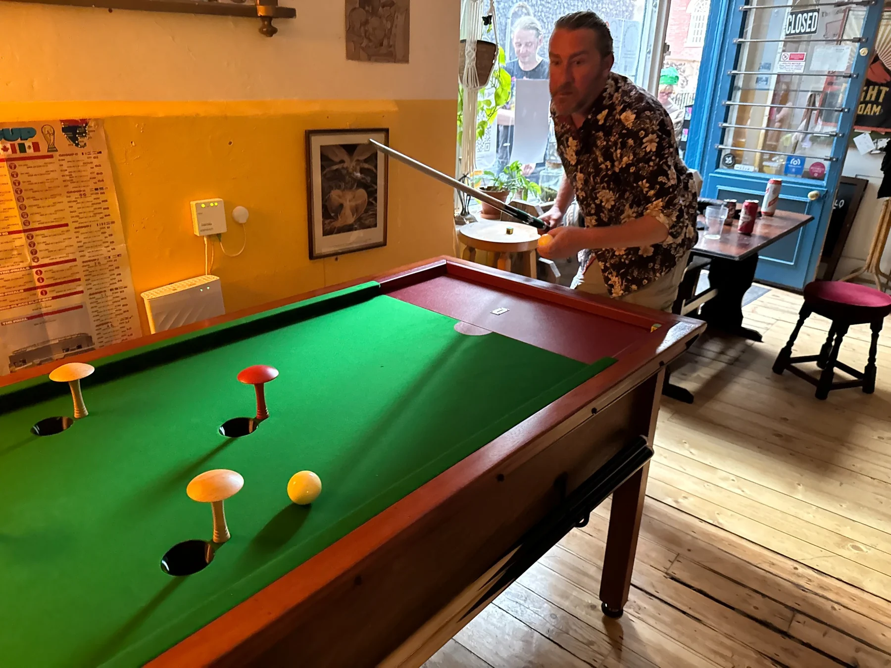 Player lining up a shot at The Holloway